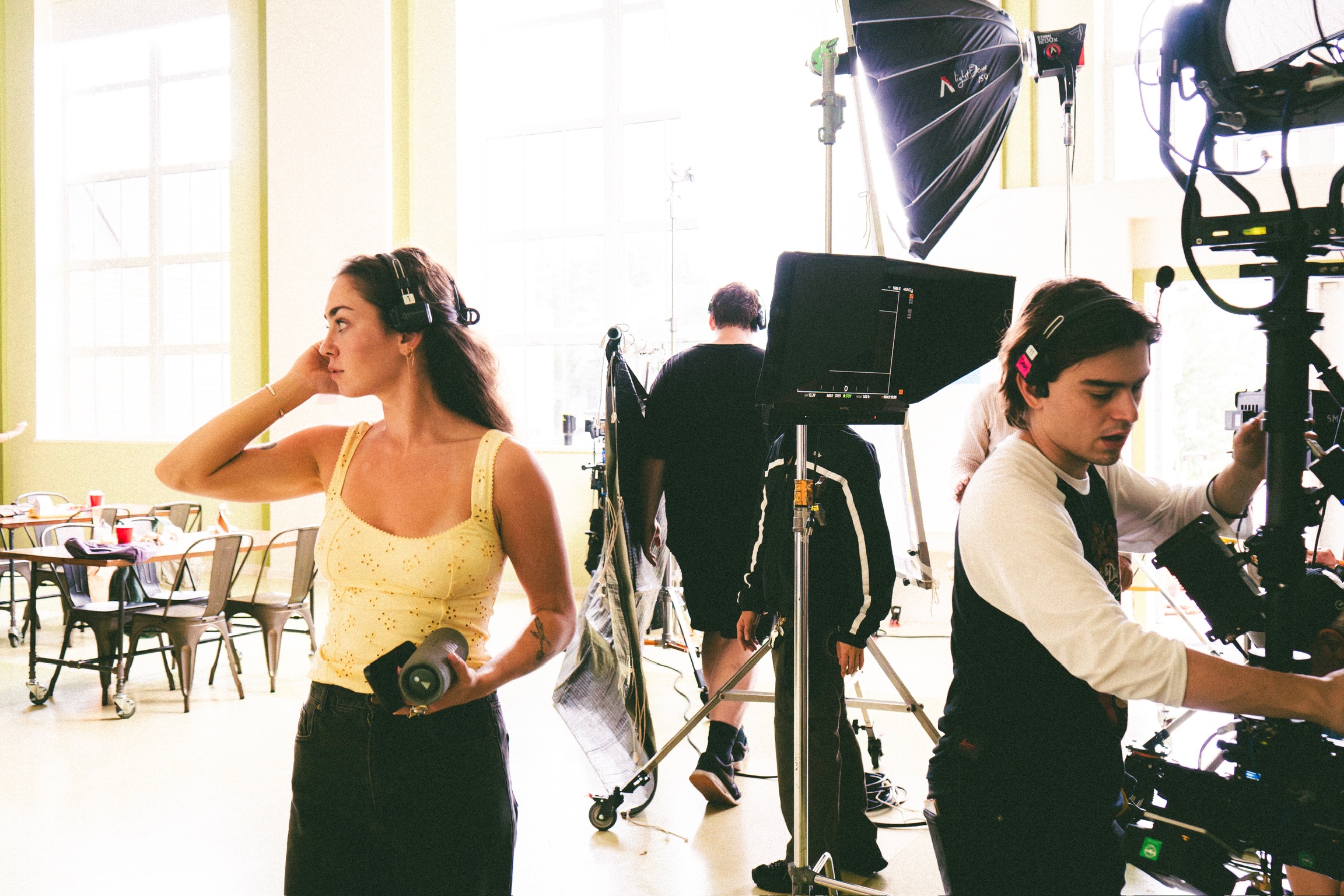 Ella on set with the camera and lighting crew